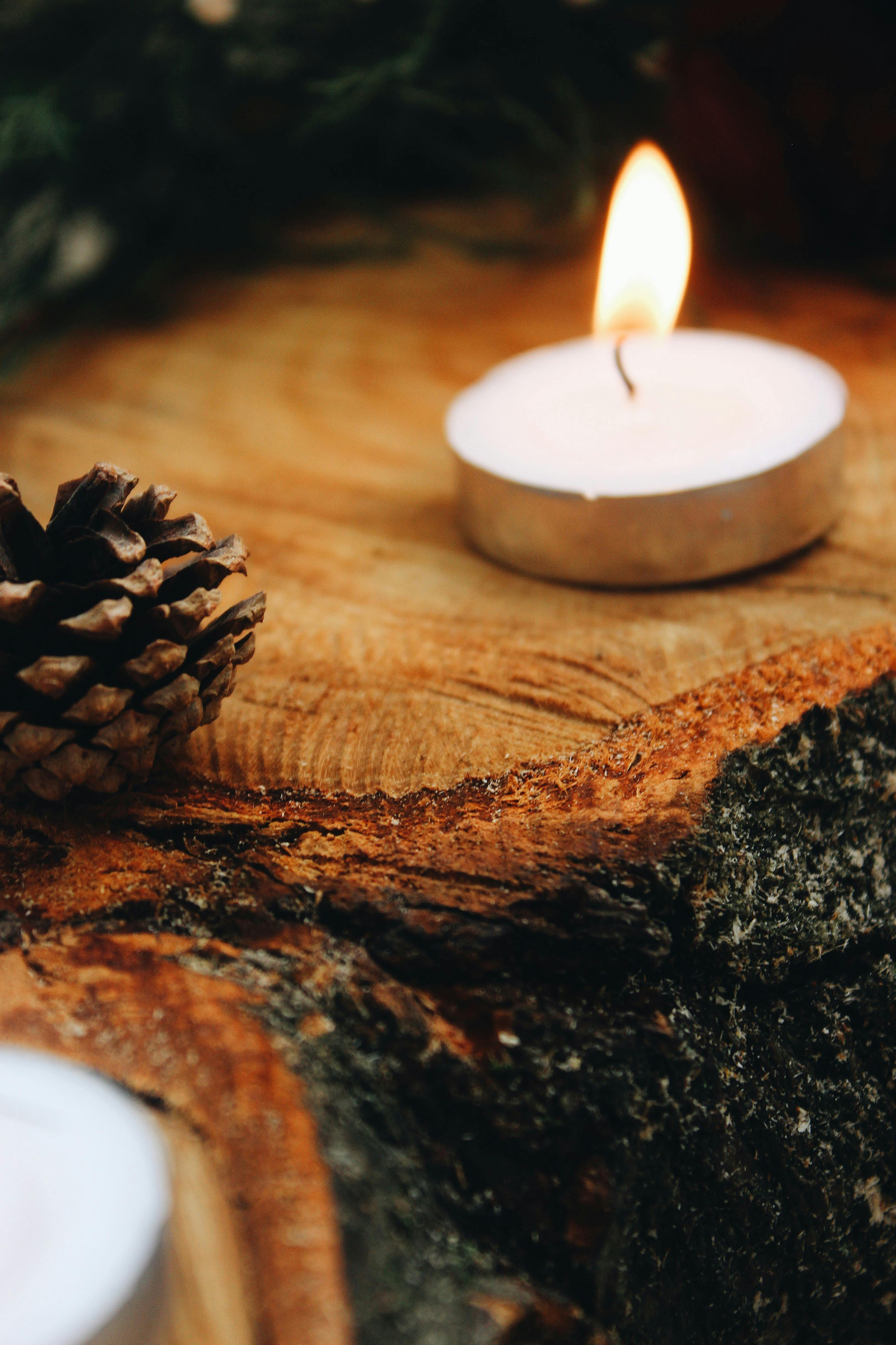 Hand-crafted candles on wood